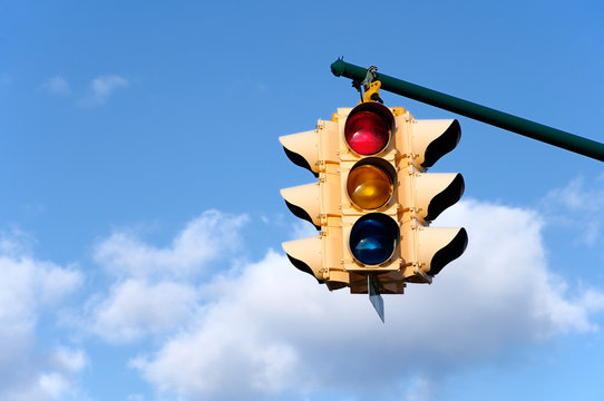 Traffic light with blue sky background