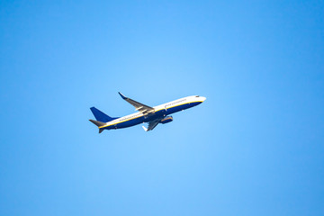 Fototapeta na wymiar Passenger plane in the blue sky.