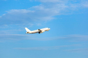 Fototapeta na wymiar Passenger plane in the blue sky.