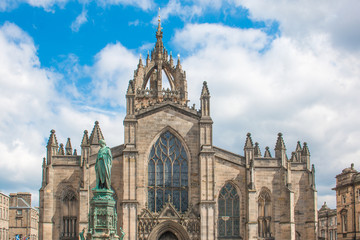 Fototapeta premium Walter Francis Montagu Douglas Scott Statue on Parliament Square next to St Giles' Cathedral Edinburgh Scotland