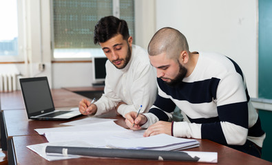 Obraz premium Students preparing for exams in classroom