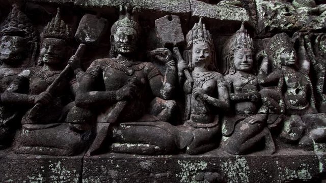 Close detailed view of stone carvings on the wall of the Terrrace of the Leper King. It is located in the northwest corner of the Royal Square of Angkor Thom, Cambodia.