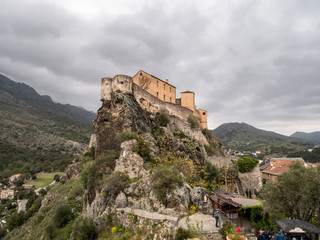 Fototapeta na wymiar Citadel on a cloudy day, fortress of historic center of Corte, Haute-Corse, Corsica, France