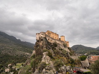 Obraz premium Citadel on a cloudy day, fortress of historic center of Corte, Haute-Corse, Corsica, France