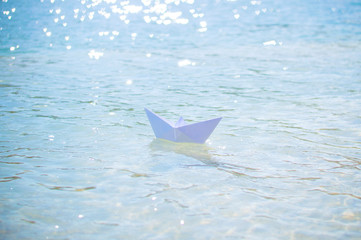 paper boat in the water