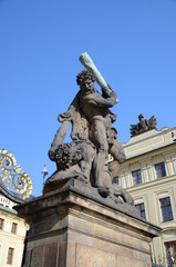 Fototapeta na wymiar Sculpures at the entrance to the New Royal Palace in Prague