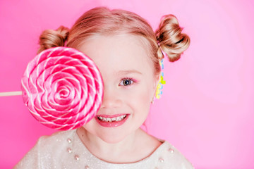 little girl with lollipop