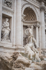 Fototapeta na wymiar Statues of the majestic Trevi Fountain in Rome
