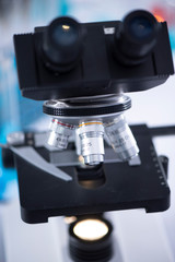 Fototapeta na wymiar modern scientist uses a microscope in a laboratory