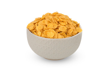 Cornflakes on a white background. Cornflakes in a bowl close-up.