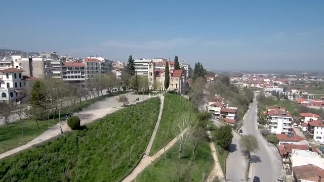 Aerial view of Greek Orthodox temple in Veria city Geece , move forward by drone