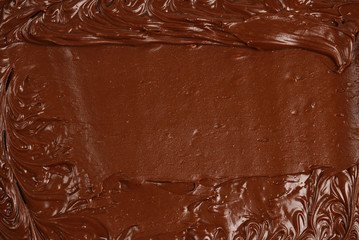 Chocolate cream background. Space for text or design.
