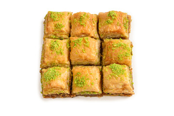 Pistachio baklava on a white background. Dessert.