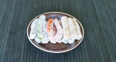 Traditional Turkish Delight. Oriental dessert on a  plate. Isolated on background. Eastern delicacy sweets. Healthy food mix assortment. Collection of different for image close up top view