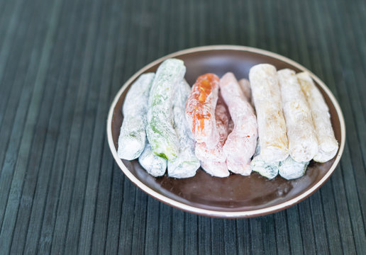 Traditional Turkish Delight. Oriental dessert on a  plate. Isolated on background. Eastern delicacy sweets. Healthy food mix assortment. Collection of different for image close up top view