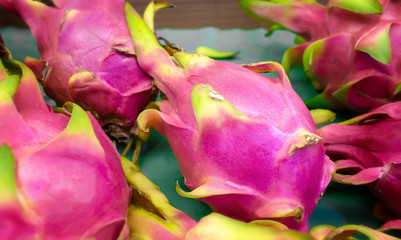 Fototapeta na wymiar Ripe Tropical Pitaya Dragon Fruit selection in the Market.
