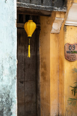 Typical traditional yellow house in the streets of Hoi An, Vietnam