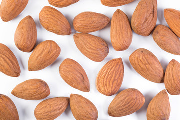 Background of crude almonds, close up, top view, nuts, healthy food.
