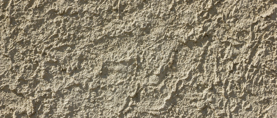 Background of the old wall. Texture of stone surface. Abstract background in retro style. Brown surface of solid material