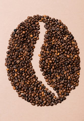 coffee beans laid out in the form of coffee beans on a paper background