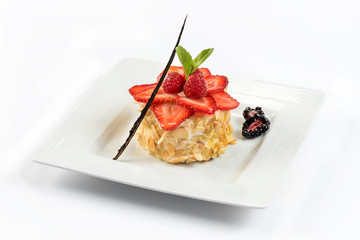 Almond covered cake. Delicious cake topped with vanilla and berries