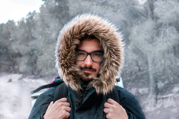 Close up portrait of a white man dressed in winter jacket