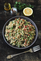 Arab salad with bulgur, parsley and vegetables. Middle Eastern cuisine.