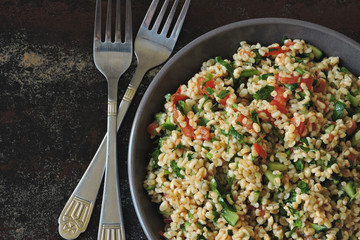 Arab salad with bulgur, parsley and vegetables. Middle Eastern cuisine.