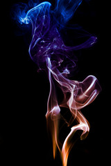 Colorful smoke on dark background