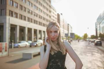 Fototapeta premium girl around the city time of her live