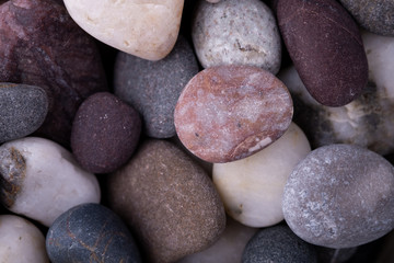 Fototapeta na wymiar Varied pebbles top view texture