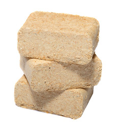 Alternative fuel, bio fuel. Wood sawdust briquettes on white background. 