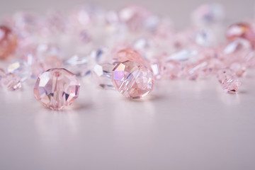 Jewelry gems beads pink and white colors close up