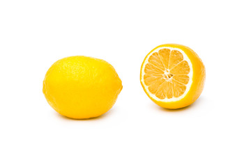 lemon with slices isolated on white background. healthy food. Group of ripe whole yellow lemon citrus fruit with lemon fruit half isolated on white background with clipping path. vitamin C.
