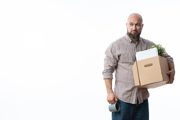 Fired businessman holding box with personal belongings.