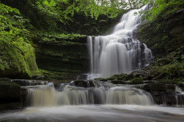 Beautiful waterfall in a forest, Scaleber Force, Yorkshire Dales