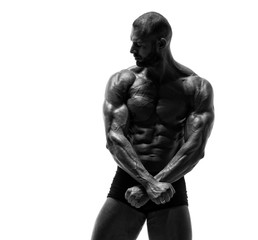 Black and White Image of Strong Muscular Men Flexing Muscles