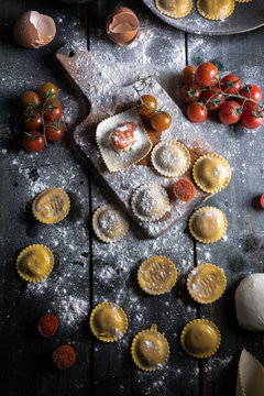 Homemade Ravioli Made With Parmesan Cheese, Tomato And Basil. Typical Dish Of Italian Cuisine