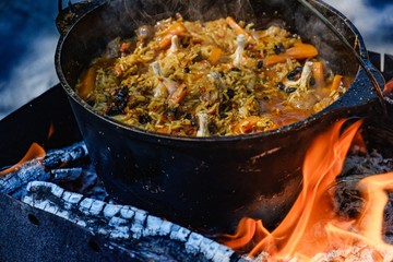 Pilaf cooking bowler bonfire boiler,  campfire flame.