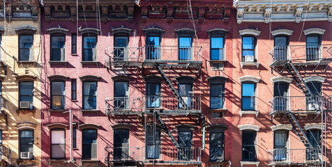 Sunlight shining on block of old buildings in the Upper East Side neighborhood in Manhattan New...