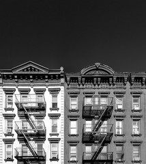 Black and white buildings with empty dark sky background in New York City