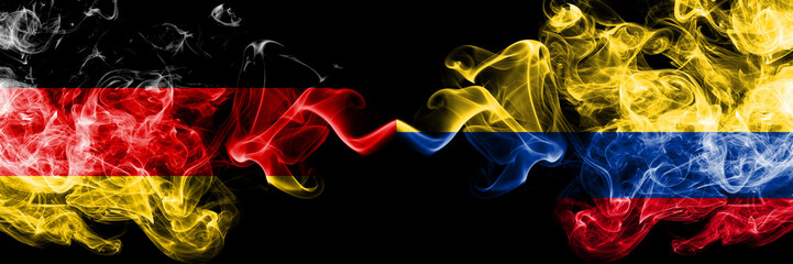 Germany vs Colombia, Colombian smoky mystic flags placed side by side. Thick colored silky smoke flags of Deutschland and Colombia, Colombian