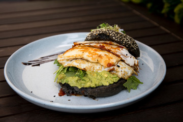 Halloumi burger with black charcoal bun