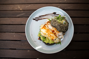 Halloumi burger with black charcoal bun