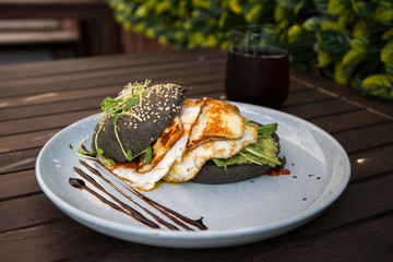 Halloumi burger with black charcoal bun