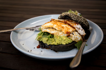 Halloumi burger with black charcoal bun