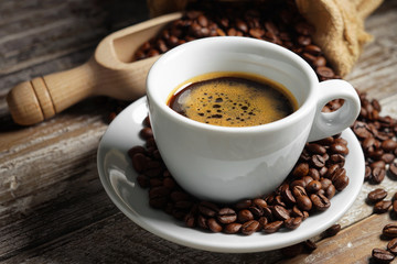 Coffee Cup And Coffee Beans Closeup