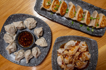 Dumplings served up with sauce in a chinese resturant