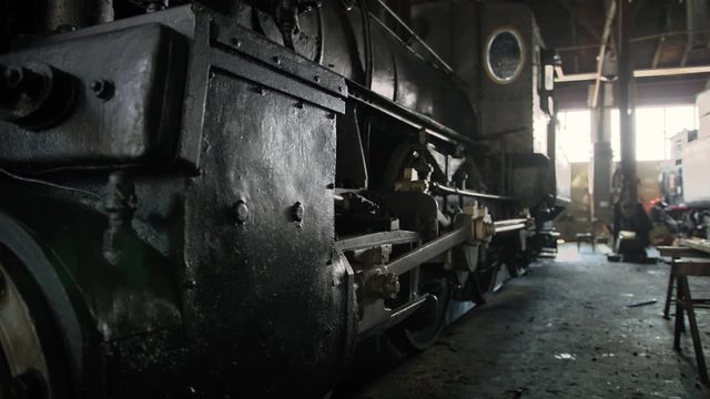 The wheel mechanism on an old steam locomotive