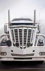 Big rig classic morning star semi truck with grille guard stands on truck stop